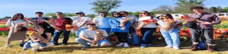 a group of people holding tulips