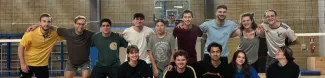 Group picture in front of the volleyball net