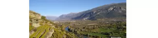 Image of a valley surrounded by mountains