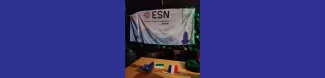 ESN Trieste flag hung near on of the tables