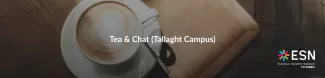 A cappuccino in a white cup on a wooden table with a spoon on the saucer. Text "Tea & Chat (Tallaght Campus)" is in the centre. ESN TU Dublin logo is on the right.